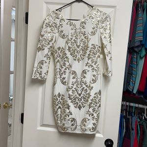 White and gold sequin dress